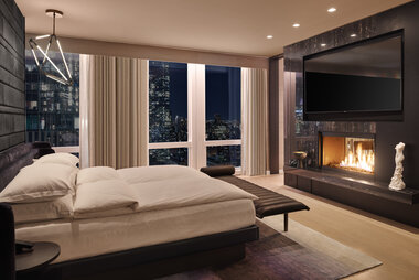 related-corporate-news-landscape-equinoxsuite-bedroom-fireplace.jpg